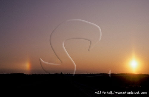 A sundog (parhelion) cause by ice crystals in misty morning air