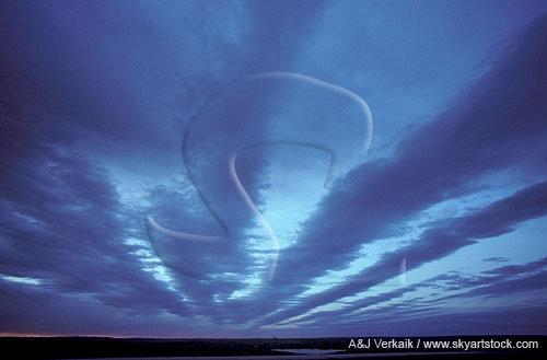 Lee wave pattern, with bands of clouds in a lee wave train