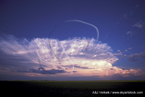 Wide view of a storm complex propagating down the wind-shift axis