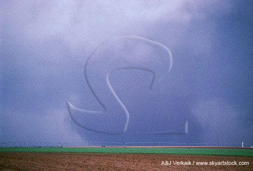 Intense tornado camouflaged by low contrast, close-up 