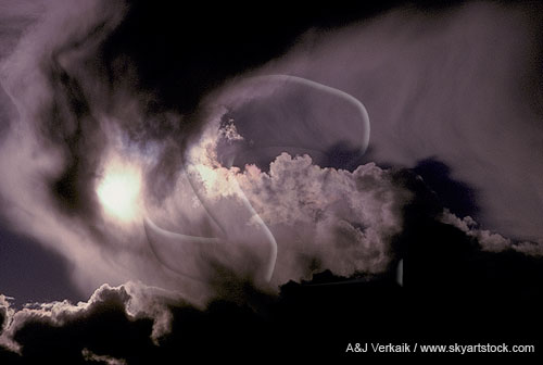 Swirling clouds cloak the sun in mystery