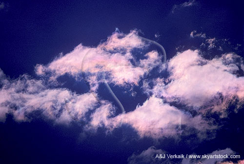 Ephemeral wisps of clouds with faint iridescence