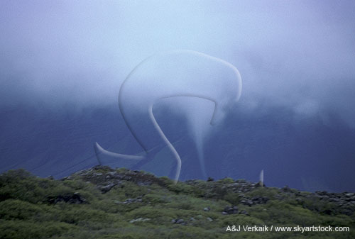 A rare tornado over a lava field in western Iceland