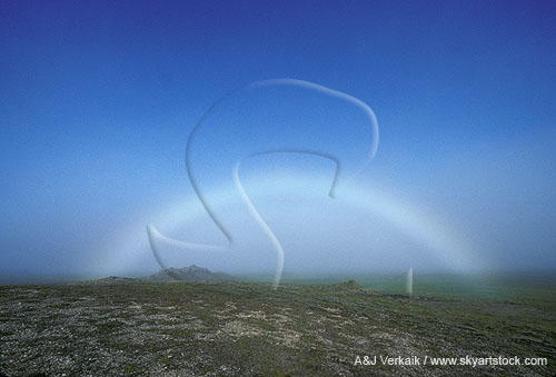 A fog bow produced by reflected sunlight on tiny water droplets