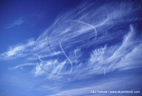 Joyous streaks of wispy clouds combed together into a textured patch