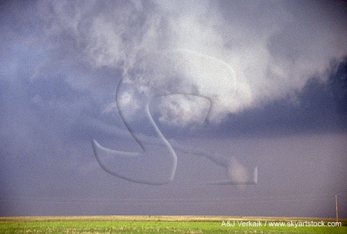 A tornado stretched by a surge of outflow winds