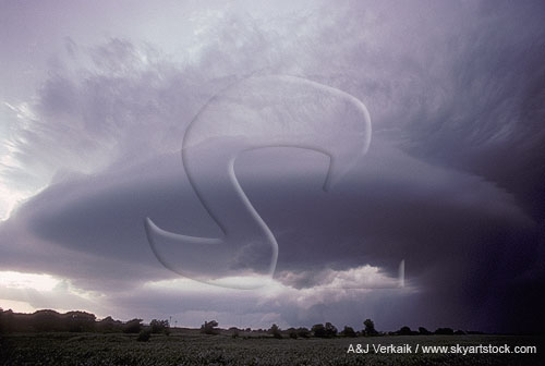 A rotating cloud in a powerful storm hovers like a spaceship