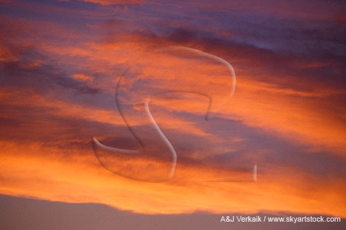 Cloud strips look like brilliant tongues of fire 