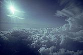Aerial photo of billowing clouds and sunlight