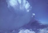 Aerial view of a Cumulonimbus storm cloud with its boiling top