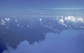 Sunlight on Cumulus clouds in an aerial scene