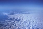 Aerial view of dense overcast from above the clouds