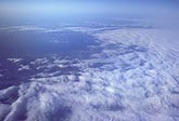 Aerial view of clouds with clearing edge visible