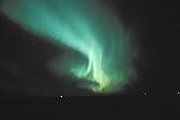 A dancing swirl of eerie green Aurora Borealis (northern lights)