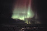 Arctic Northern lights in the form of red and green drapery