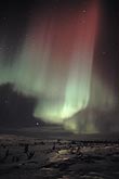 A sweep of red and green drapery in an Aurora Borealis display