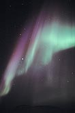 Red and green rays of northern lights (Aurora Borealis)