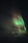 Ghostly patches of green and red Aurora Borealis