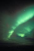 Eerie bands of green northern lights