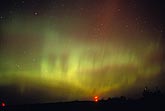 Fantastic northern lights (Aurora Borealis) in a starry sky