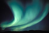 Blue-green wavy bands of northern lights (Aurora Borealis)