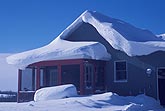 A heavy lobed snow load on a country house