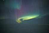 Curtains and swirls of green, red and purple Aurora Borealis