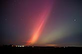 Brilliant spears of red, pink and green Aurora Borealis 