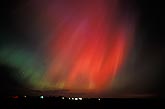 Baptism by fire: red northern lights (Aurora Borealis) 