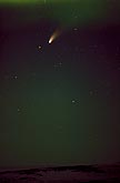 Comet Hale-Bopp streaks through a starry arctic night sky