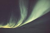 Brilliant flares of green northern lights (Aurora Borealis)
