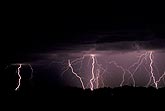 Multiple lightning strikes in the dark of night
