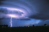 Brilliant lightning with an illuminated laminar wall cloud
