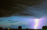 A brilliant highly electric single lightning bolt strikes terror