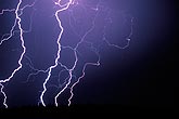 Close multiple lightning strikes with fine, colored filaments