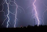 Close-up of hairy cloud-to-ground lightning bolts