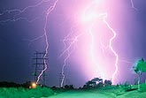 A blast of electricity, as brilliant lightning flashes in a power corridor