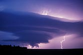 Mesocyclone and wall cloud with lightning at night