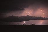 Cloud-to-ground lightning with low outflow clouds