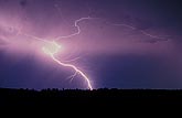 A looped and knotted lightning superbolt sears through the sky