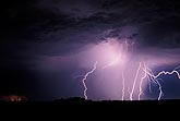 Lightning bolts illuminating a storm