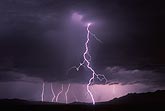 A twisted cloud-to-ground lightning strike in the mountains