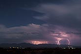 Distant lightning strikes in the mountains