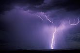 Struck by lightning: brilliant lightning illuminates a rain shower