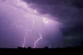A fine lightning film in front of a rain curtain