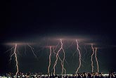 Lightning strikes over city