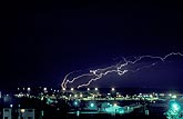 A tangle of unusual horizontal lightning over a city