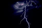Close-up of bright single lightning bolt (cloud-to-ground)