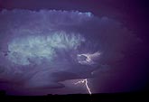 Storm cloud with lightning in twilight