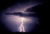 Forked lightning under a dark cloud